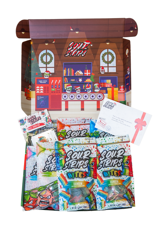 The SourStrips Holiday Gift Box-Fourteen Pack features colorful candy packs, limited edition stickers, and a gift card in a festive box with a holiday kitchen scene printed inside the lid.