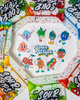 Retro sour strips stickers in center of photo with many different characters and the retro color logo. The stickers are surrounded by the top half portion of sour strips candy in different flavors. Everything is on a white background