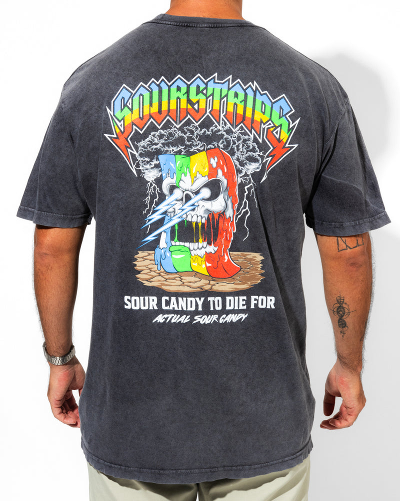 A person sports the SourStrips Sour Storm Tee, a black unisex cotton shirt with vivid back graphics of angry sour candy strips zapped by lightning, plus "Sour Strips" and "Sour Candy To Die For" text—a bold choice for graphic tee fans.