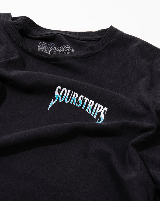 The Blue Venom Tee by SourStrips is a black unisex cotton shirt with "SOURSTRIPS" in bold white and blue across the chest, laid flat and slightly wrinkled, featuring a "LARGE" inner tag for easy sizing.