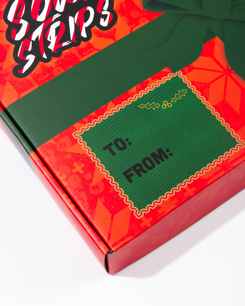 Close up picture of the "TO AND FROM" part of the sour strips box. The box is red and green in color.